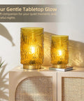 Cordless Battery Powered Table Lamp With LED Bulb And Timer delivers a lit glow leaf-veined glass yellow lamp on dresser