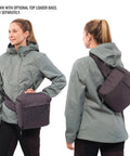 Sidecountry 32 Camera Backpack With Modular Top Loader Inserts Black And White worn across chest and back, outdoor gear view