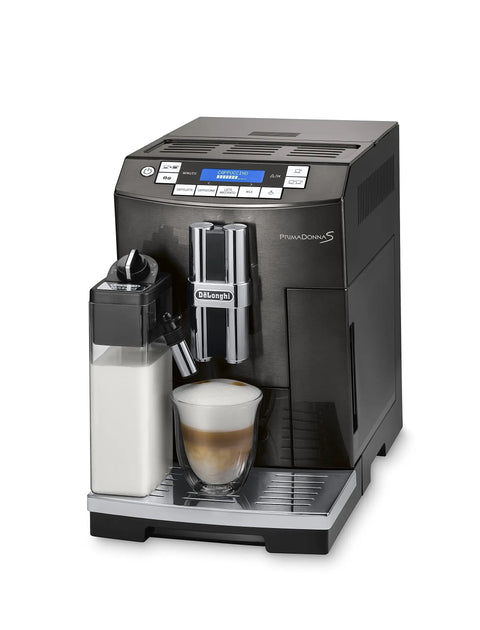 Real Deal Fully Automatic Espresso Machine With Single Touch Lattecrema Setup For Creamy Cappuccino Foam Black Coffee Maker with milk container and foam.