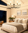 Killer 8 Light Black Chandelier With Dang Sharp Matte Finish For Farmhouse Dining Room And Kitchen Island Sleek Hanging Ceiling Lamp Featuring Adjustable Height and Wide Circular Frame above a cozy bedroom setting.