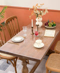 Clear Table Protector Mat 14 By 24 Inches, 1.5mm Thick Heavy Duty Desk Cover on a wooden dining table, protecting surface.