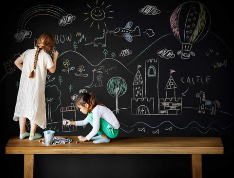 Kids drawing on wall using Chalkboard Paint Kit Two Pack Black Brush On Dope Finish Delivers Smooth Writable And Erasable Slate