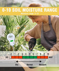 Woman using Six In One Soil Tester With Light, Moisture, pH, Temperature, Humidity, And Nutrient Readings for indoor plants