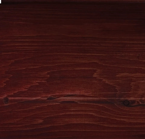 Premium One Coat Wood Stain Sealer For Log Homes In Black Canyon Red finish on smooth wooden surface, showing rich red tones.