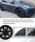 Snag These Fresh Multi Spoke Wheel Covers For Tesla Model Y 19 Inch Hubcaps 2020 To 2024 Four Piece Set showcasing matte black design.
