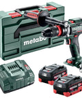 18V Cordless Driver Drill Kit Handles Heavy Demands With Two 18V 5.5Ah Batteries And A Badass Tool Free Quick Change Chuck Featuring Killer Anti Kickback Gyro Protection For Fast Metal Work in a green case with batteries and charger.