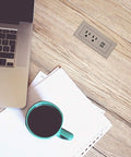 Radiant Furniture Power Center With USB recessed power strip on wooden desk by laptop and coffee, nickel finish charging hub