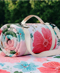 Waterproof Extra Large Picnic Blanket For Outdoor Activities Great For Beach And Camping Mat rolled up with floral pattern