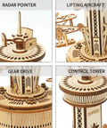 Close-up of 3D Wooden Puzzle Mechanical Music Box Aircraft Model Kit showing radar pointer, lifting aircraft, gear drive, control tower.