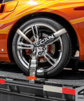Beefed Up Car Tie Down Straps With Flat Hooks Lasso Style 2 Inch By 96 Inch Four Pack securing orange car on trailer