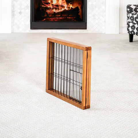 Folded view of 22 To 62 Inch Super Wide Dog Gate With Small Pet Door, freestanding wooden gate for wide openings in living room.