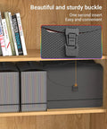 Grab And Go Expandable Accordion File Folder Boasting 25 Roomy Pockets A Heavy Duty Plastic Carry Handle Bright Index Tabs And Seamless Doc Sorting For Bills Daily Mail And A4 Letters Truly A Slick Setup on a shelf with books.