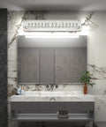 Crystal Chrome LED Vanity Light Bar For Bathroom, 18W over mirror fixture illuminating modern bathroom with marble walls