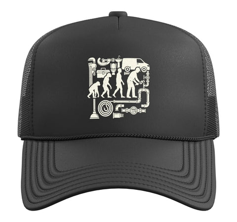 Daily Grind Plumber Evolution Trucker Hat For Dedicated Pipefitters And Licensed Plumbing Technicians With Breathable Mesh Panels And Adjustable Snap Closure In Black showcasing front design with plumbing graphics.
