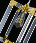 Gold Pendant Light Fixture With Brushed Brass Finish and acrylic frame with visible bulb inside