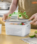 Person opening a 5 Pack Large Fridge Storage Containers With Removable Colander, Leakproof Design, Dishwasher And Microwave Safe, Keeps Fruits, Vegetables, Berries And Meats Fresh Longer