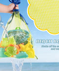 Collapsible Beach Toy Set For Kids Ages 3 To 12 in mesh bag with water pouring through on beach
