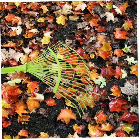 Dope Garden Rake Hand Tool With Tough Tines For Loosening Soil And Cultivating Flowers And Plants Lightweight Gardening Supply For Lawn Maintenance Ideal For Weeding Dethatching And Easy Garden Care, green steel leaf rake on wet soil