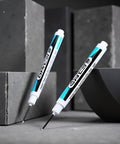 Top Shelf Four Pack Bold White Oil Based Permanent Markers Featuring Slick Quick Dry Ink And Razor Fine Nibs on gray background.