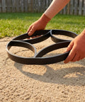 Hands placing DIY Garden Paving Mold Round Pattern Concrete Paver Tool For Outdoor Pathways Patios And Walkways on sand