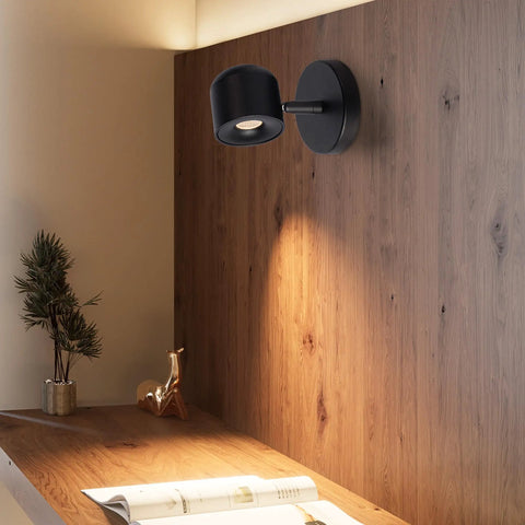 2 Packs Modern Adjustable Black LED Wall Sconce Lights With Rotating Angle 3000K Warm White 7W High CRI 97 Perfect For Hallway Gallery Display Bedside Bedroom Accent mounted on wood panel wall above desk.