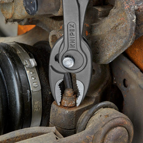 8 Inch Pliers With Front And Side Gripping in action on a rusted nut, showcasing front jaw gripping stripped screws in tight spaces