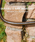Close-up of Heavy Duty Garden Hose 6 Feet Long 5/8 Inch Hybrid Water Hose showing durability and kink-resistance on a brick wall.