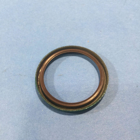 Front view of an oil seal, 1-1/8 x 1-3/8 x 1/8 in, brown inner lip with green outer housing.