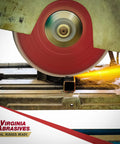 Sparkie Premium Diamond Blade For Concrete Cuts, 14 Inch wet or dry saw blade cutting metal pipe, sparks flying.