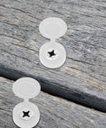 Close-up of 100 Pieces Large White Hinged Screw Cover Caps Set on wood surface, showing snap cover design with integrated washers.