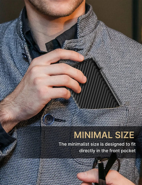 Man inserting Pop Up Aluminum Card Wallet With RFID Blocking into front pocket of gray jacket, highlighting minimal size