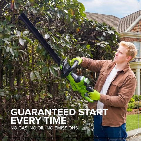 Man using 40V 26 Inch Brushless Hedge Trimmer Tool Only With Rotating Rear Handle For Easy Vertical Cuts And Pro Level Crisp Trims Cordless Power For Quick Pruning And Up To 60 Minutes Run Time With 2Ah Battery on garden hedge