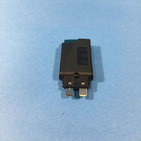 Hella Tough Thermal Miniature Circuit Breaker With Plug In Screw Fuse Terminal Block For 2 Amp 250V AC And 65V DC Panel Applications  front view on blue background.