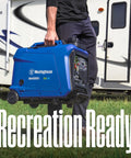 Person holding 4000 Peak Watt Dual Fuel Portable Inverter Generator with Remote Start near RV, blue casing, telescoping handle.