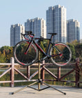 Heavy Duty Bike Repair Stand For E Bikes And Mountain And Road Bikes Up To 88 Lbs With Adjustable Height in urban setting