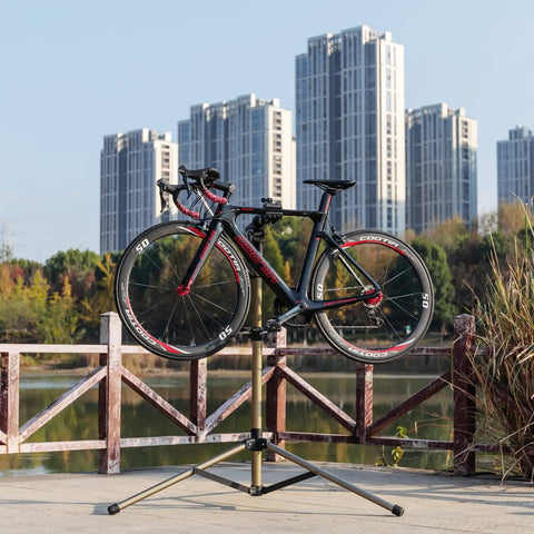 Heavy Duty Bike Repair Stand For E Bikes And Mountain And Road Bikes Up To 88 Lbs With Adjustable Height in urban setting