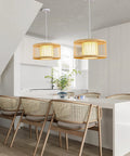 Boho Rattan Pendant Light 15.8 Inch Coastal Drum Hanging Fixture above dining table in modern kitchen