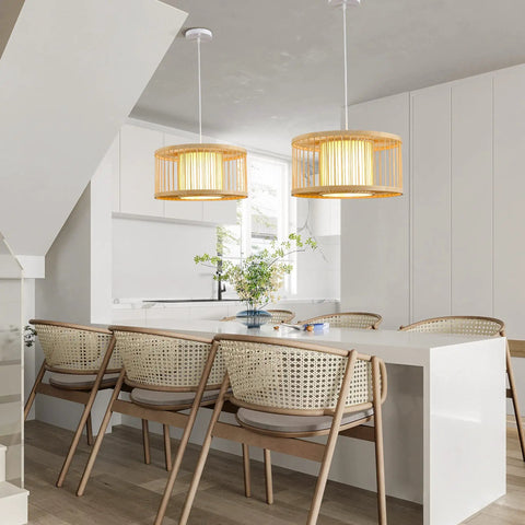 Boho Rattan Pendant Light 15.8 Inch Coastal Drum Hanging Fixture above dining table in modern kitchen
