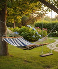 Hammock hung with 4 Pack 20 Inch Stainless Steel Swing Chains With Carabiners And Spring Snap Links in outdoor garden setting.