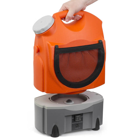 Person lifting detachable tank from On The Go Portable Spray Washer With Built In Water Tank, Rechargeable Battery Or Car Or Home Plug