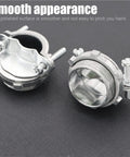 Two silver zinc NM clamp type cable connectors for metallic conduit shown from front and side view on black surface