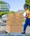 Person using a 35 Inch Long By 21 Inch Wide Aluminum Platform Truck Foldable Cart With 800 Lb Capacity Workhorse Flatbed Dolly outdoors