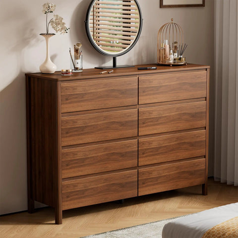 Mid Century Modern Dresser Boasting Eight Spacious Drawers And A Rich Walnut Finish Resting On Robust Wood Legs in a bedroom.