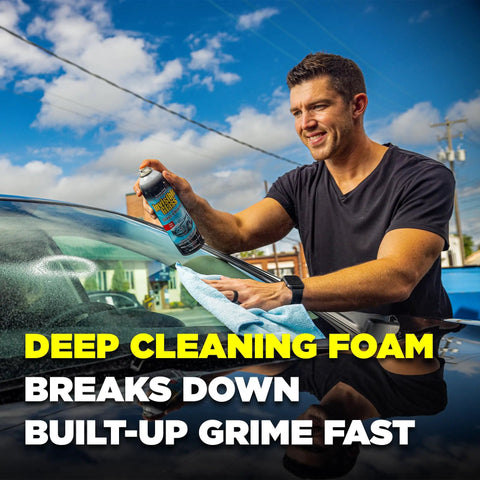 Person using Top Shelf Foaming Auto Glass Cleaner Blast Away Road Grime And Bird Droppings From Windshield And Windows Without Leaving Streaks Or Smudges For A Flawless Shine Every Time 19 Ounce Spray Pack Of 2 on car windshield.