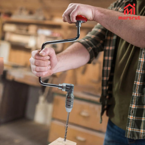 Person using Hand Crank Brace Drill 12.8 Inch With 4 Jaw Chuck For Square End Bits Only Old School Woodworking Tool in a workshop.
