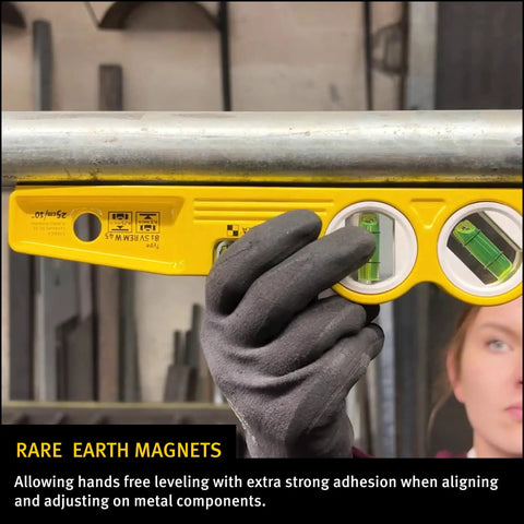 Die Cast Three Vial Torpedo Level With 1 Percent And 2 Percent Slope Rings, Vertical Plumb Vial, And 45 Degree Vial in use with magnet