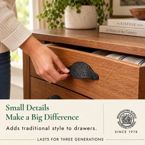 Close-up of hand using a Premium Black Wrought Iron Floral Drawer Pull Cup Bin Handle 4.5 Inch on wooden drawer.