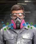 Person wearing All-In-One Half Face Respirator With Anti-Fog Goggles For Woodworking Dust And Allergens, protective mask shown in use