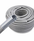 Ironclad Flex Gray Conduit 64mm X 10M Thickened Wire Cable Protector Sleeve on a roll for electrical wiring management.