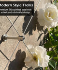 Heavy Duty Tension Wire Trellis Kit For Outdoor Gardens Comes Complete With Crosshead Hubs Wall Anchors Cable Cutters Plus Fifty Three Feet Of Sturdy Stainless Lines To Make Your Garden Look Pretty Badass, showing minimalist design and white flowers.